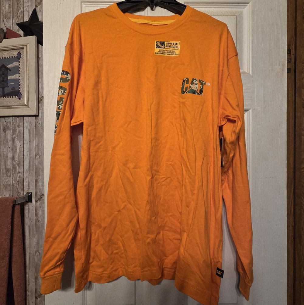 CAT Caterpillar Men's Large orange with digital camouflage.